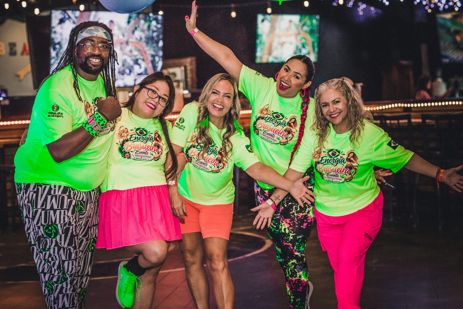 A group dancing at the Zumba Glow in the Dark Party